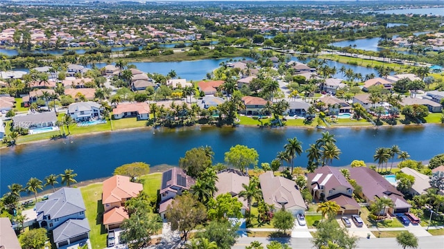 bird's eye view featuring a residential view and a water view