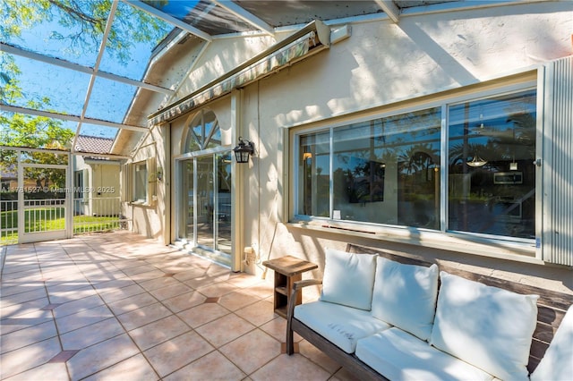 view of patio with a lanai