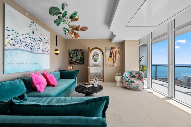 3737 Collins Ave Unit S-1303, Miami Beach, FL 33140 - living area featuring floor to ceiling windows and a water view