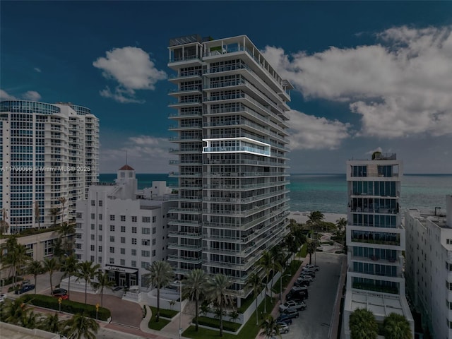 3737 Collins Ave Unit S-1303, Miami Beach, FL 33140 - view of building exterior featuring a water view and a view of city