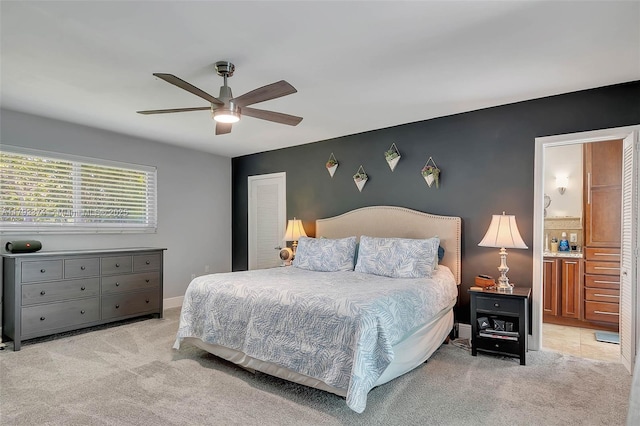 16840 SW 87th Ave, Palmetto Bay, FL 33157 - bedroom with light carpet, connected bathroom, and ceiling fan