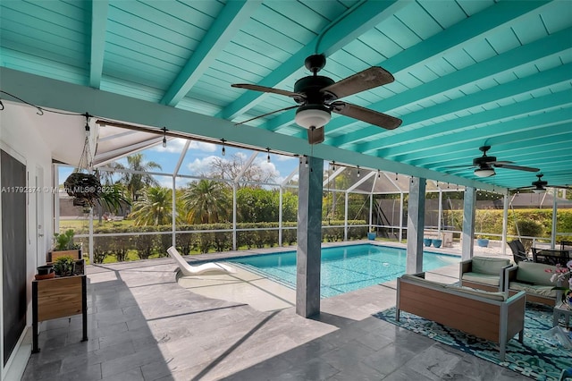 16840 SW 87th Ave, Palmetto Bay, FL 33157 - outdoor pool featuring ceiling fan, a patio, and glass enclosure