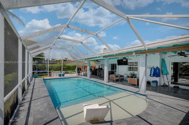 16840 SW 87th Ave, Palmetto Bay, FL 33157 - swimming pool with a ceiling fan, a patio area, and glass enclosure