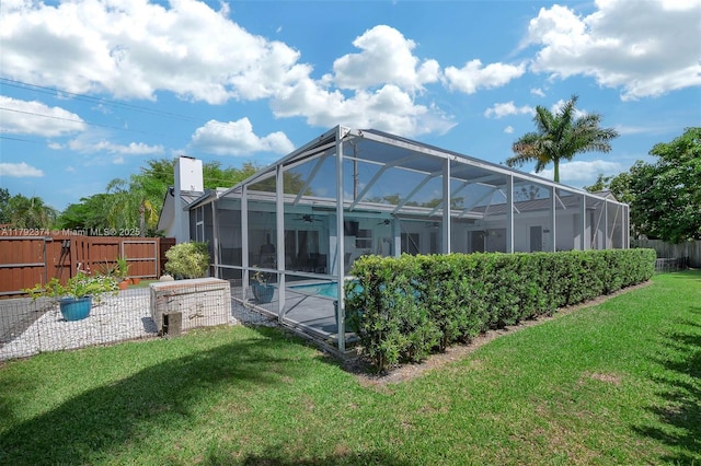 16840 SW 87th Ave, Palmetto Bay, FL 33157 - back of property with a ceiling fan, a fenced backyard, a lanai, and a patio