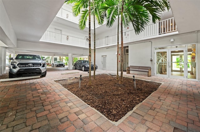 1770 E Las Olas Blvd Unit 507, Fort Lauderdale, FL 33301 - interior space with a high ceiling and french doors