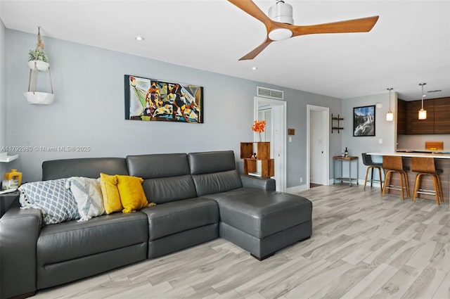 1770 E Las Olas Blvd Unit 507, Fort Lauderdale, FL 33301 - living room with a ceiling fan, light wood-style flooring, baseboards, and recessed lighting
