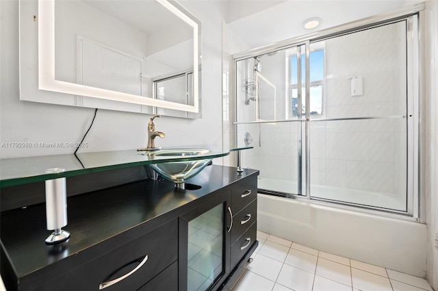 1770 E Las Olas Blvd Unit 507, Fort Lauderdale, FL 33301 - bathroom with combined bath / shower with glass door, vanity, and tile patterned floors