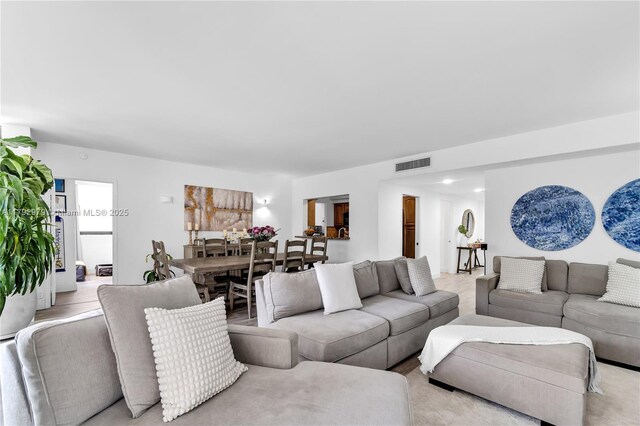 living room with visible vents