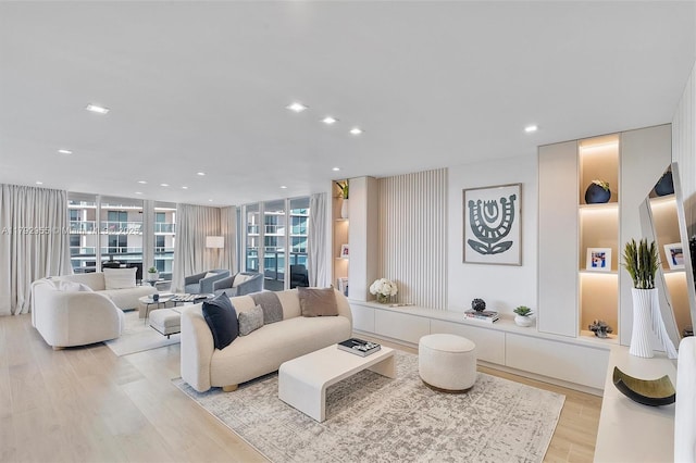 2127 Brickell Ave Unit 2704, Miami, FL 33129 - living area featuring recessed lighting, wood finished floors, and expansive windows