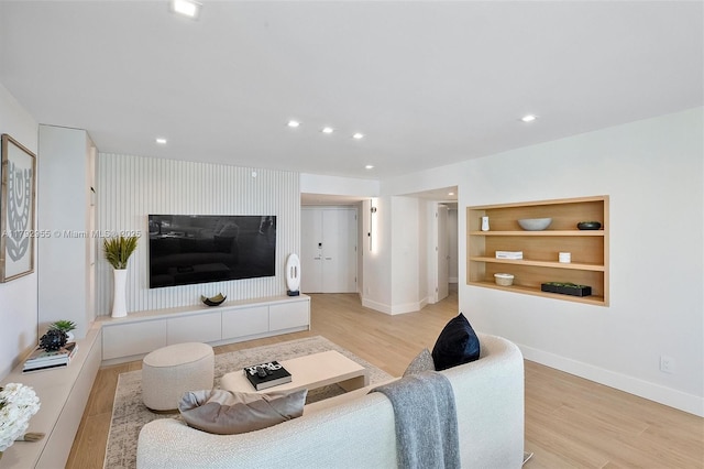 2127 Brickell Ave Unit 2704, Miami, FL 33129 - living area featuring recessed lighting, baseboards, built in shelves, and light wood-style floors