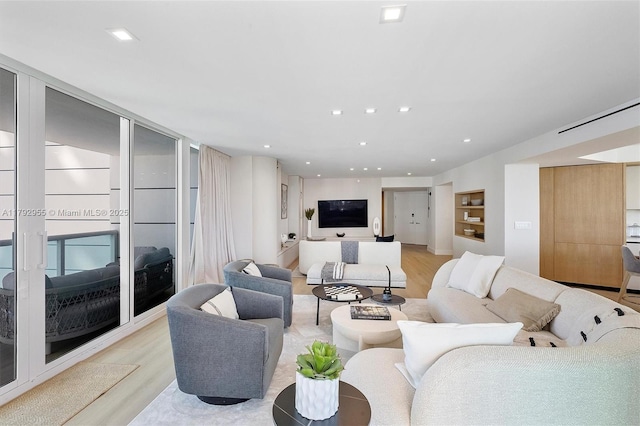 2127 Brickell Ave Unit 2704, Miami, FL 33129 - living area featuring recessed lighting and light wood-style floors