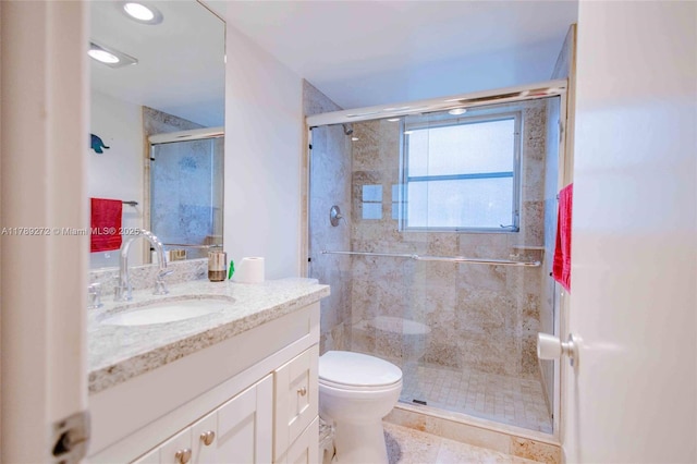 2751 N Palm Aire Dr Unit 310, Pompano Beach, FL 33069 - bathroom with vanity, toilet, and a shower stall