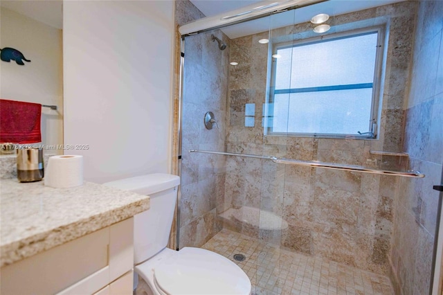 2751 N Palm Aire Dr Unit 310, Pompano Beach, FL 33069 - bathroom featuring vanity, toilet, and a shower stall