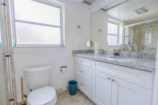2751 N Palm Aire Dr Unit 310, Pompano Beach, FL 33069 - full bathroom featuring vanity, a shower stall, toilet, and tile patterned floors