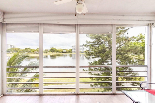 2751 N Palm Aire Dr Unit 310, Pompano Beach, FL 33069 - unfurnished sunroom with a water view