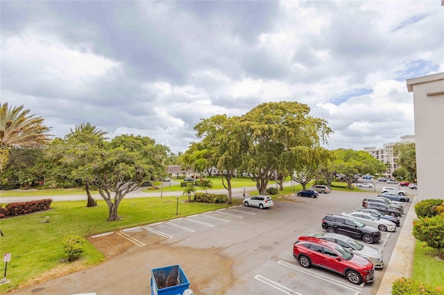 2751 N Palm Aire Dr Unit 310, Pompano Beach, FL 33069 - view of uncovered parking lot