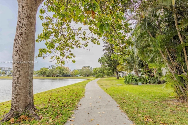2751 N Palm Aire Dr Unit 310, Pompano Beach, FL 33069 - view of property's community with a lawn and a water view