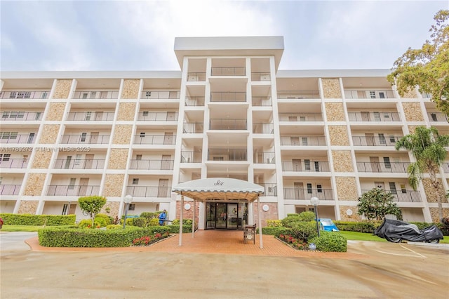 2751 N Palm Aire Dr Unit 310, Pompano Beach, FL 33069 - view of apartment building / complex