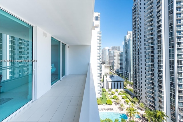 1080 Brickell Ave Unit 2504, Miami, FL 33131 - balcony featuring view of pool and a city view