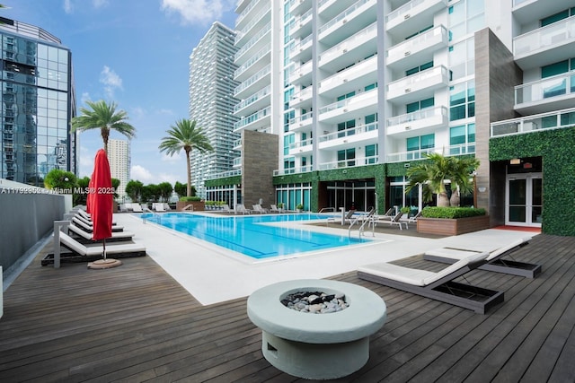 1080 Brickell Ave Unit 2504, Miami, FL 33131 - community pool featuring a wooden deck