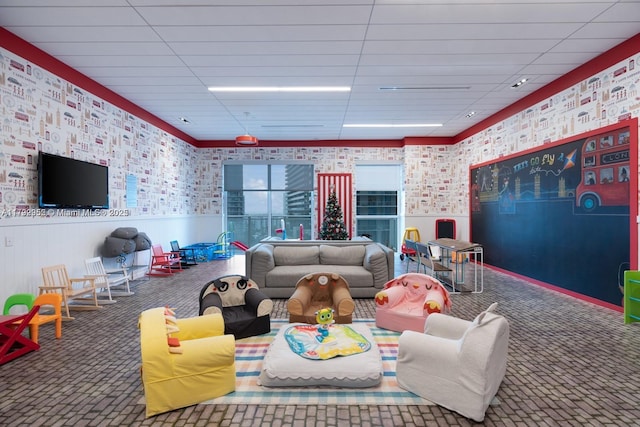 1080 Brickell Ave Unit 2504, Miami, FL 33131 - living room featuring carpet floors, a wainscoted wall, wallpapered walls, and a paneled ceiling