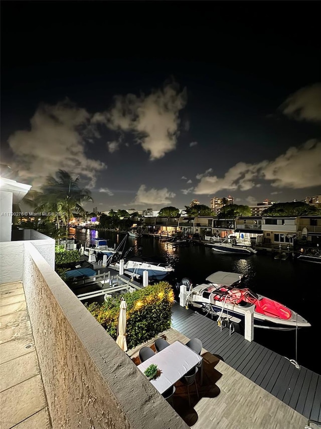view of dock with a water view