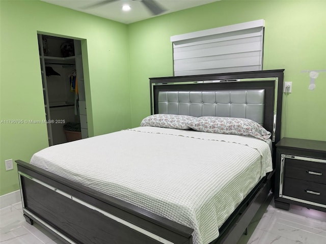 729 E 23rd St, Hialeah, FL 33013 - bedroom with a spacious closet, a closet, recessed lighting, and marble finish floor