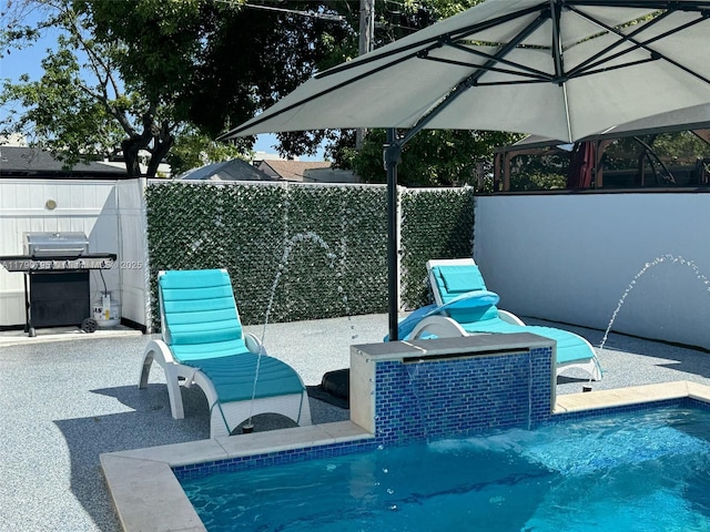 729 E 23rd St, Hialeah, FL 33013 - view of patio / terrace with a fenced in pool, fence, and a grill