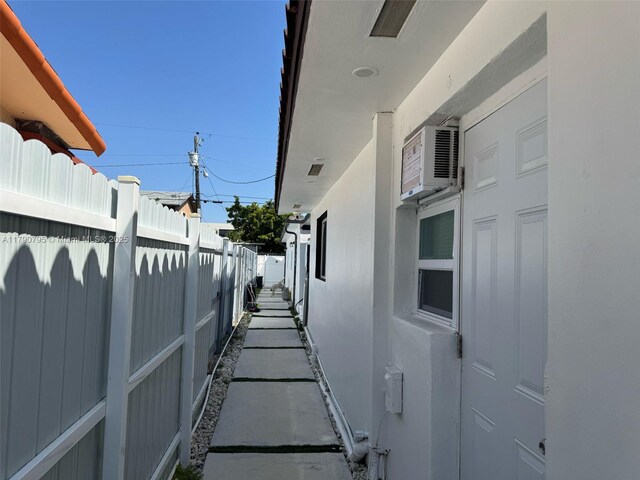 729 E 23rd St, Hialeah, FL 33013 - view of property exterior featuring stucco siding and fence