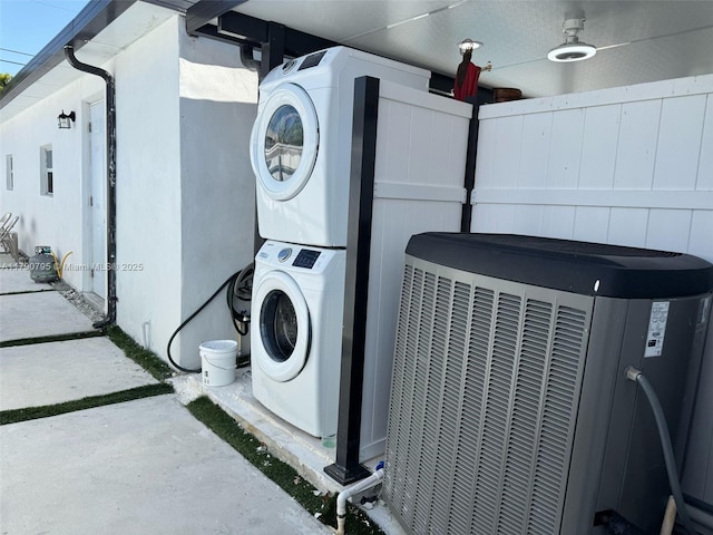 729 E 23rd St, Hialeah, FL 33013 - laundry area featuring laundry area and stacked washer / drying machine