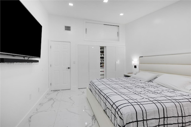 14712 SW 84th Ter, Miami, FL 33193 - bedroom featuring a closet, light marble finish floors, and recessed lighting