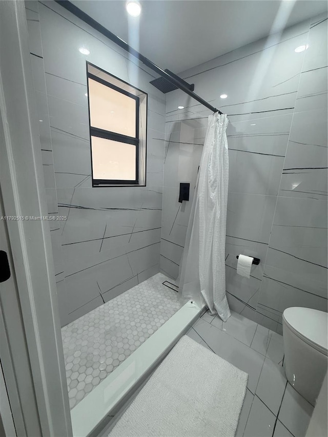 14712 SW 84th Ter, Miami, FL 33193 - bathroom featuring a stall shower, toilet, and marble finish floor