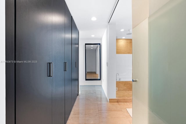 hallway with recessed lighting