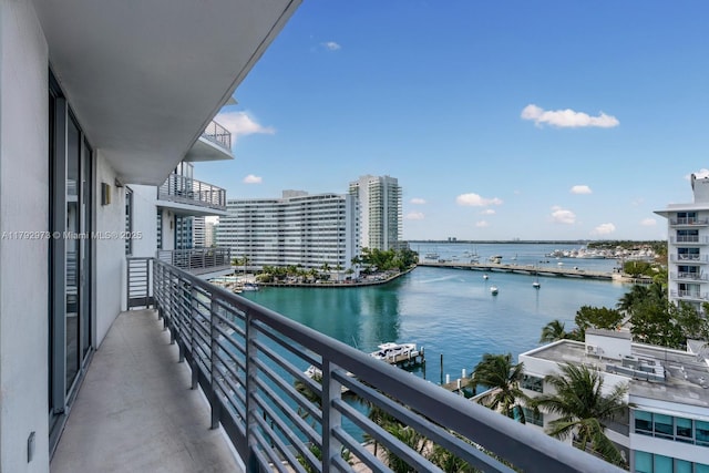 balcony featuring a water view