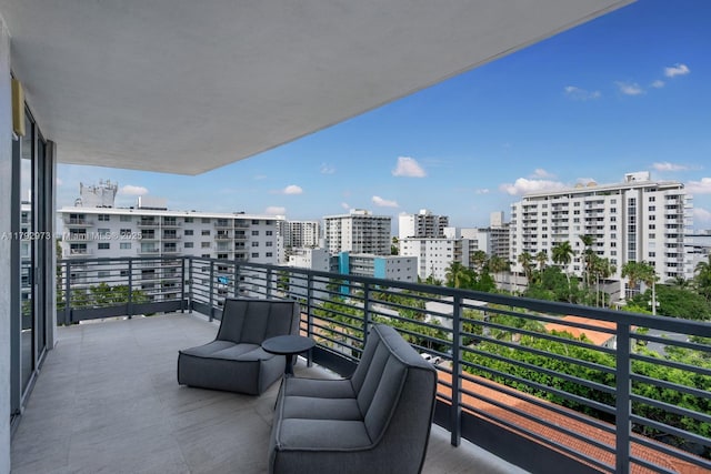 balcony featuring a view of city
