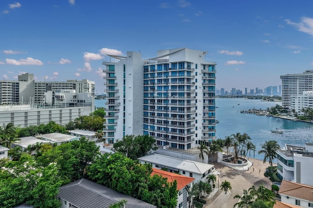 view of property featuring a view of city and a water view