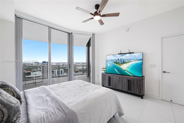 851 NE 1st Ave Unit 2604, Miami, FL 33132 - bedroom featuring access to outside, a wall of windows, light tile patterned floors, and a ceiling fan