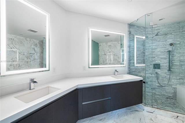 851 NE 1st Ave Unit 2604, Miami, FL 33132 - bathroom with marble finish floors, double vanity, and a shower stall