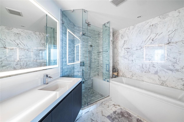 851 NE 1st Ave Unit 2604, Miami, FL 33132 - full bathroom with a garden tub, vanity, a shower stall, and marble finish floors