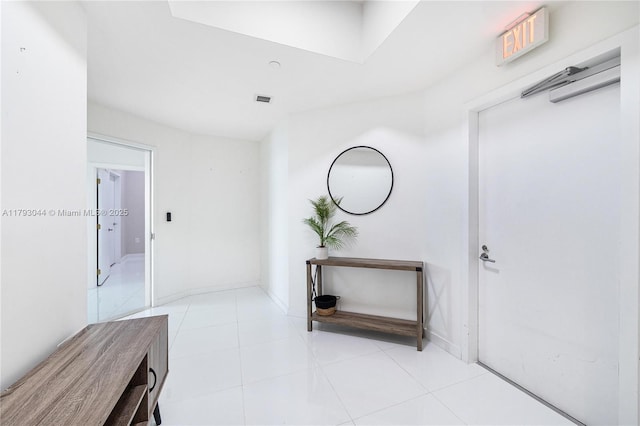 851 NE 1st Ave Unit 2604, Miami, FL 33132 - hall with light tile patterned floors
