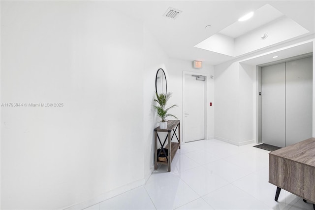 851 NE 1st Ave Unit 2604, Miami, FL 33132 - hallway featuring recessed lighting, light tile patterned floors, and elevator