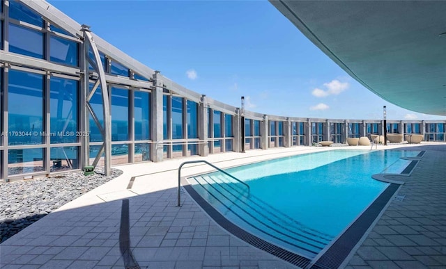 851 NE 1st Ave Unit 2604, Miami, FL 33132 - community pool featuring a patio