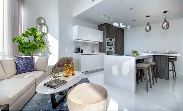 851 NE 1st Ave Unit 2604, Miami, FL 33132 - living room with rail lighting