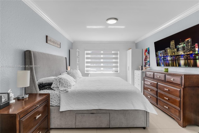 bedroom with light tile patterned floors and ornamental molding
