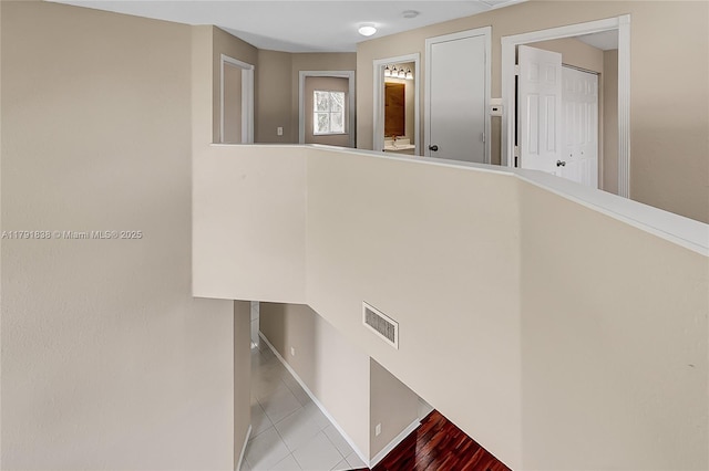 interior space featuring visible vents and baseboards