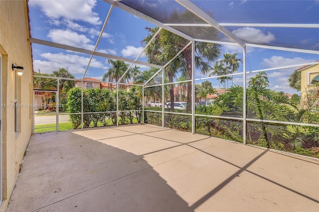 view of patio with a lanai