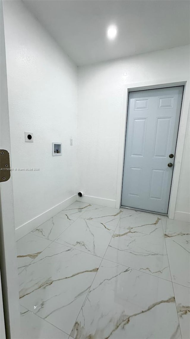 laundry area featuring laundry area, marble finish floor, baseboards, electric dryer hookup, and washer hookup