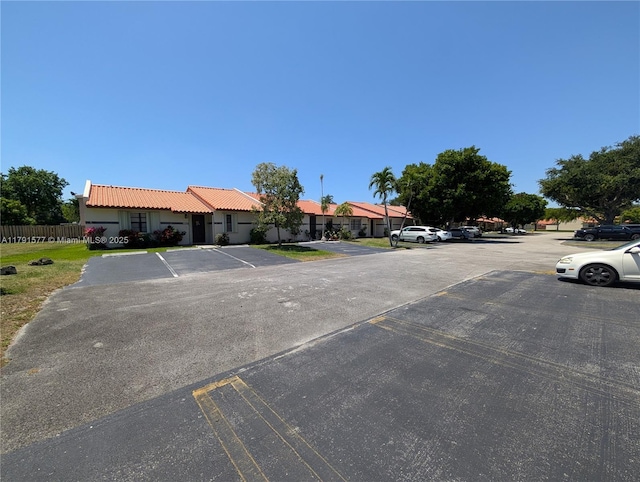 11212 SW 58th Cir, Cooper City, FL 33330 - uncovered parking lot with fence