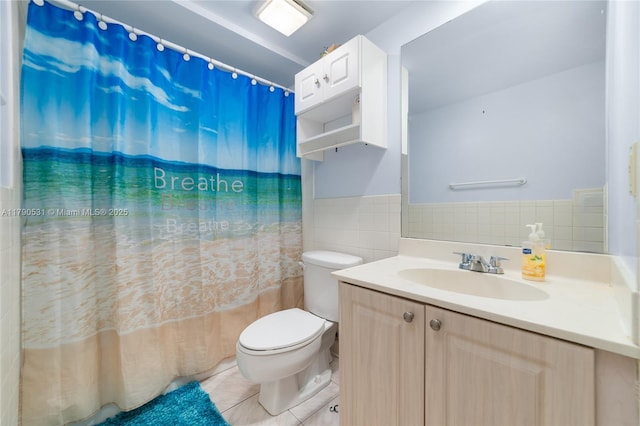 720 7th Ln, Green Acres, FL 33463 - bathroom with tile patterned flooring, vanity, toilet, tile walls, and a shower with curtain