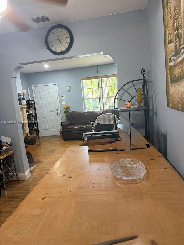 40 NE 49th St, Miami, FL 33137 - living area with arched walkways and wood finished floors